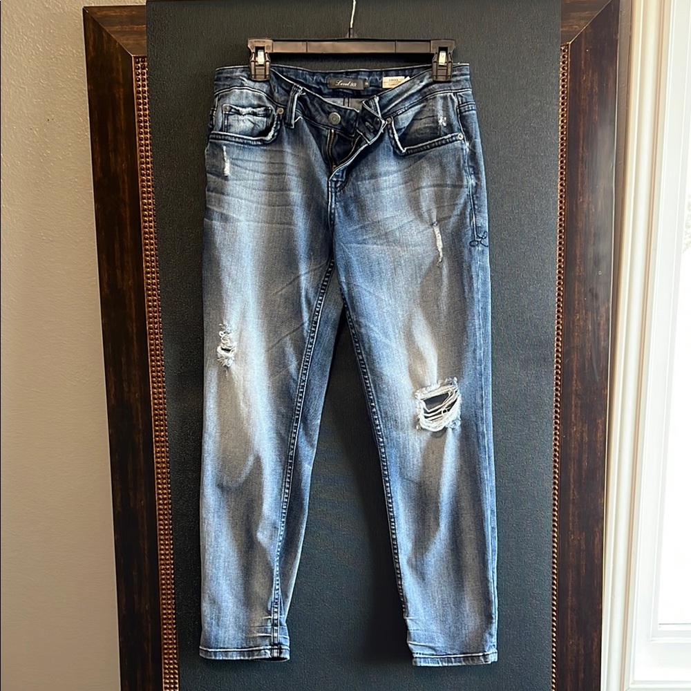 Distressed Blue Jeans